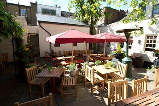 The Windsor Castle Kensington  Properly old  the Grade IIlisted building dates to 1826  the Windsor Castle is off the...