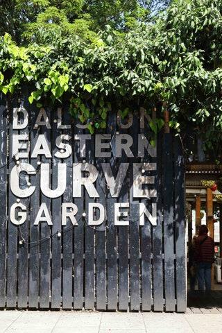 As soon as you enter the wooden walkway of the Curve Garden the frenetic buzz of Dalston instantly dampens and...